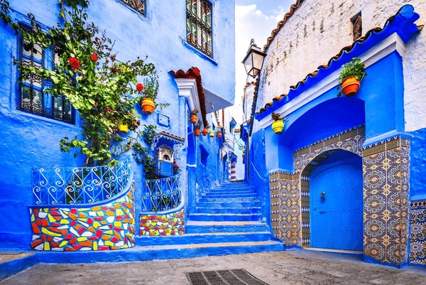 Blue-painted staircase alley in Chefchaouen